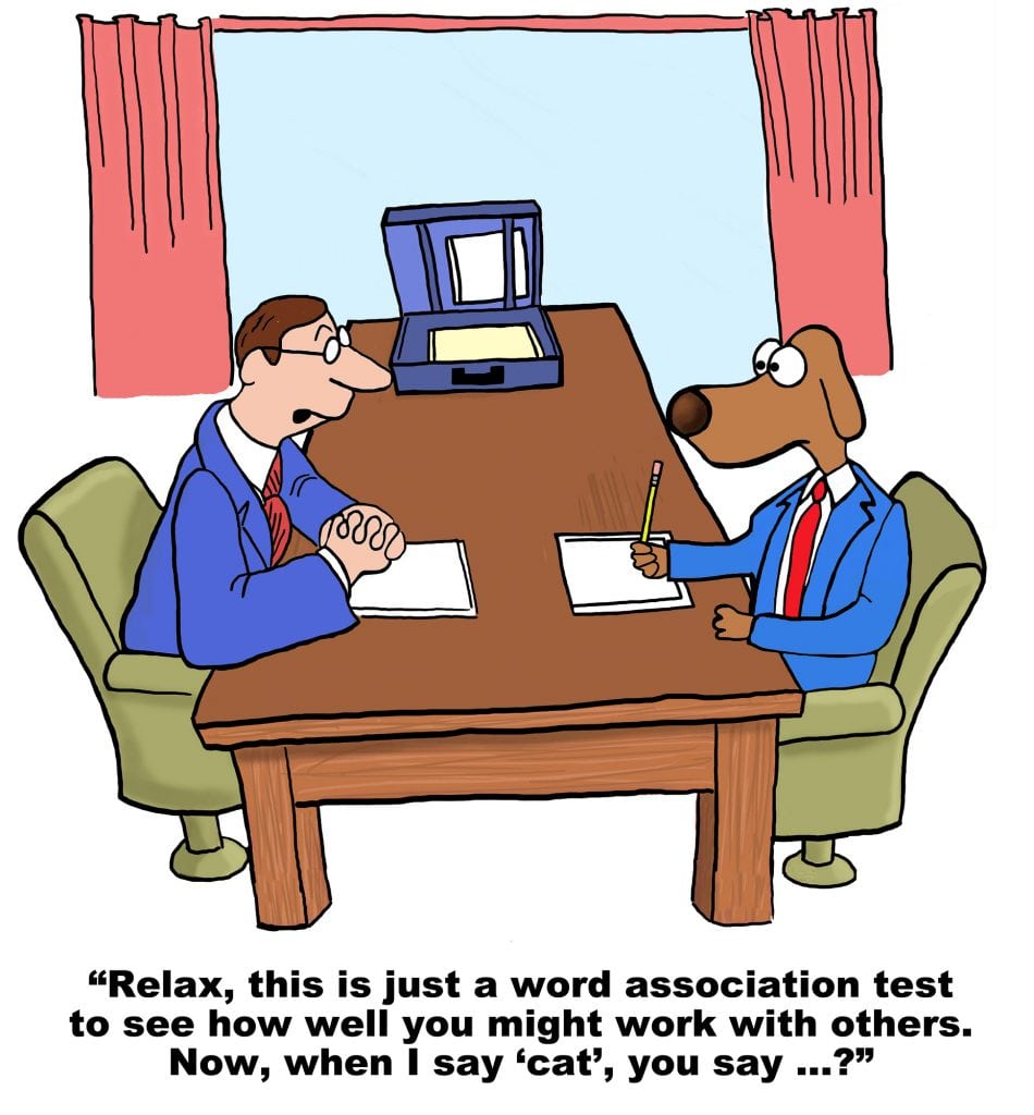 Cartoon of businessman dog interviewing for a new job.  As part of the recruiting process he has to take a personality test.  The first word association is cat....